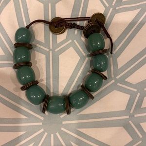 Green Jade bracelet with copper embellishment.